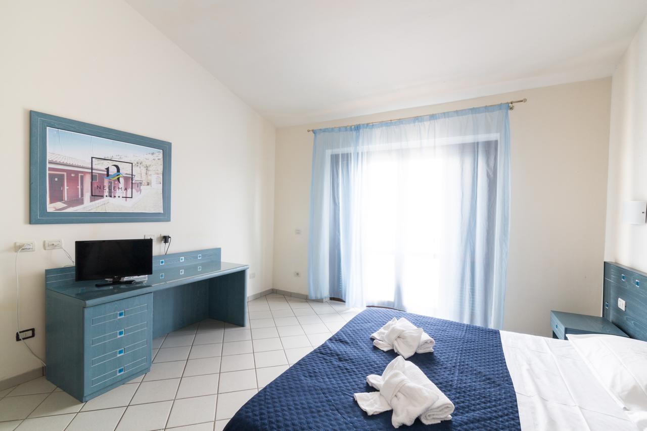 Nelema Village Resort Сан-Никола-Арчелла Номер фото